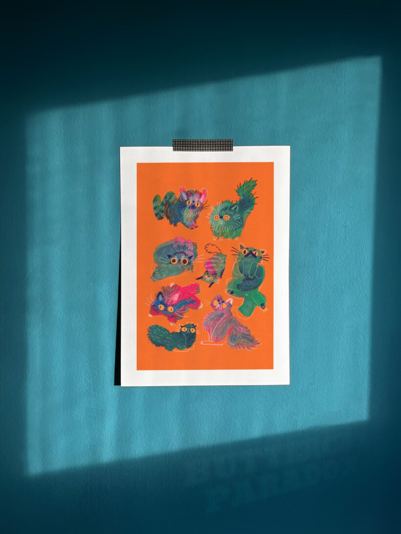 Art print of green angry blob cats on a bright orange background