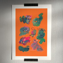 Art print of green angry blob cats on a bright orange background